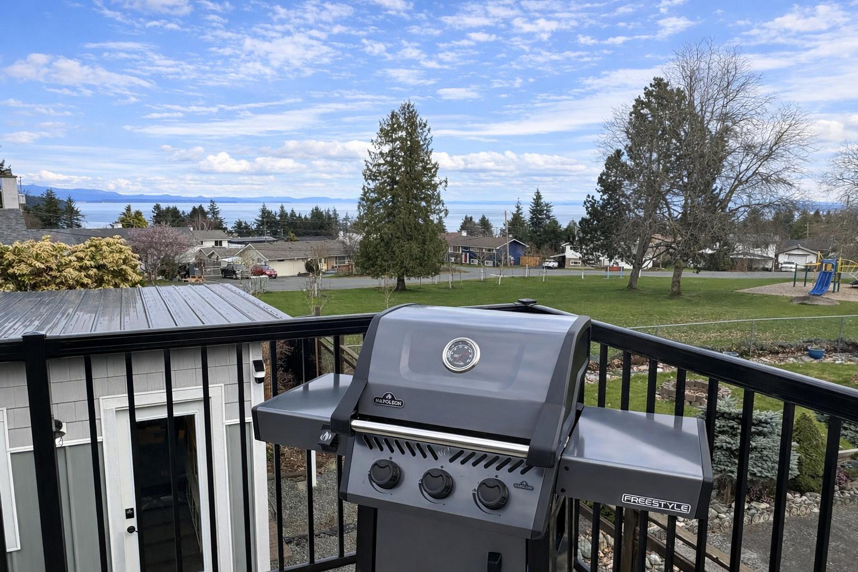 Gas BBQ on deck with ocean view