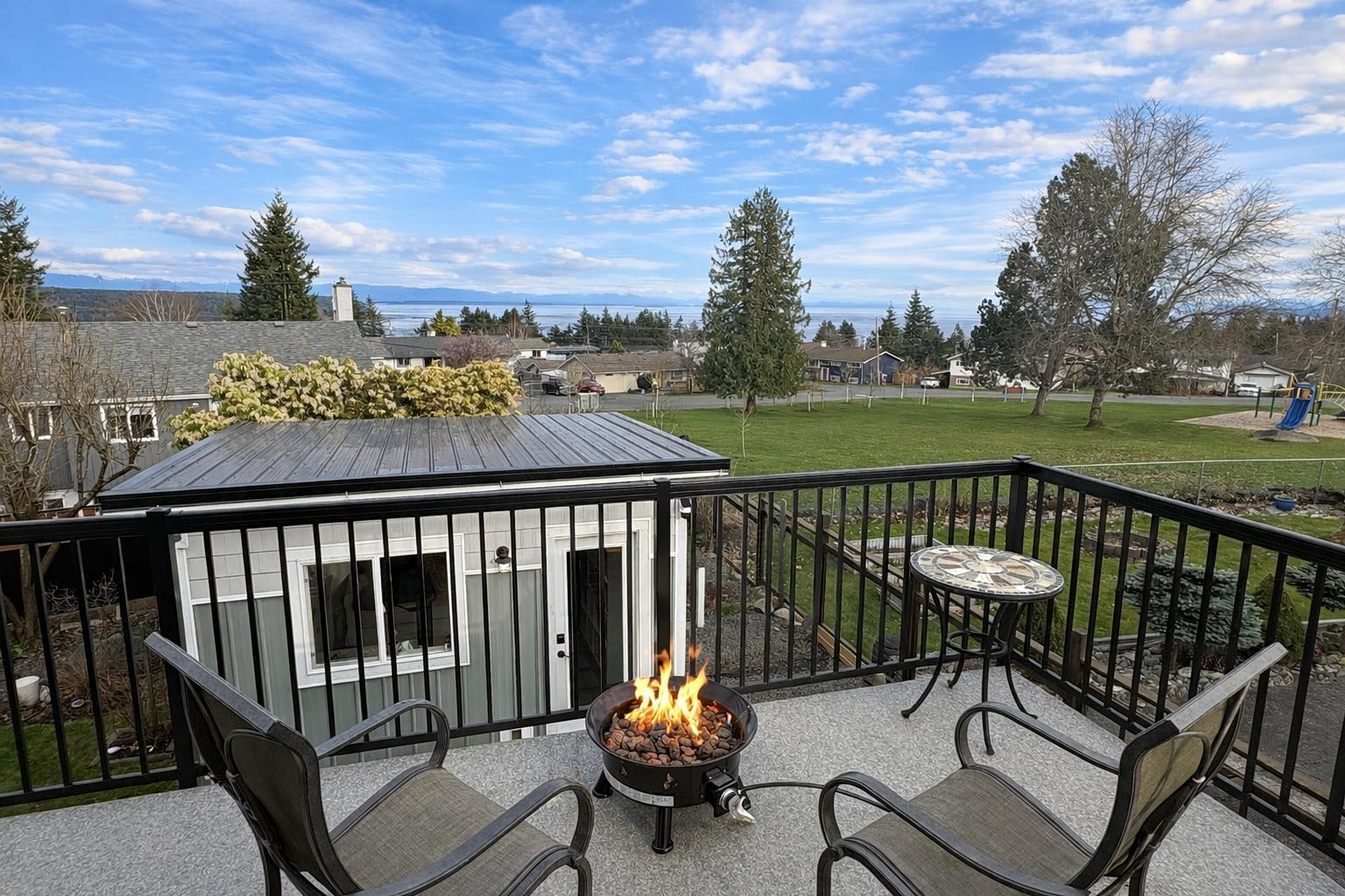Deck fire pit with ocean view